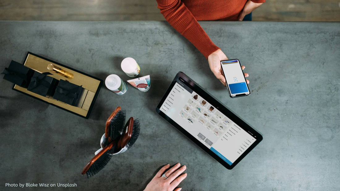 Customer paying for items with phone