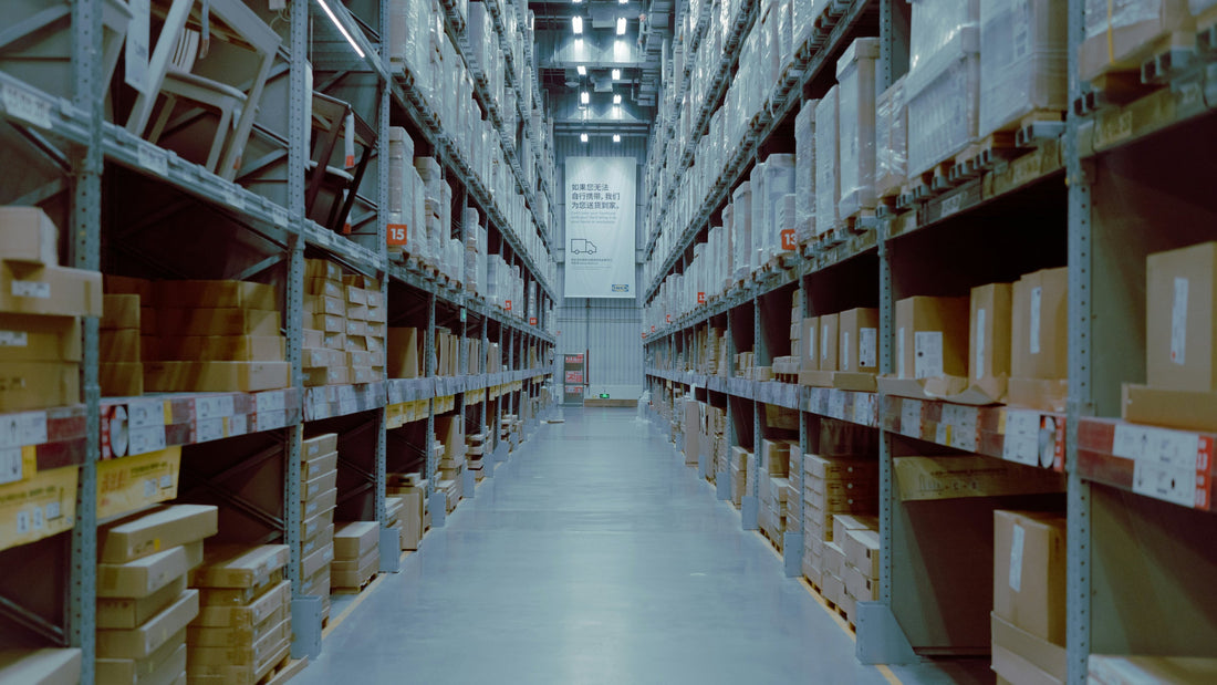 Empty warehouse shelf slot among stocked shelving, representing an oversold order